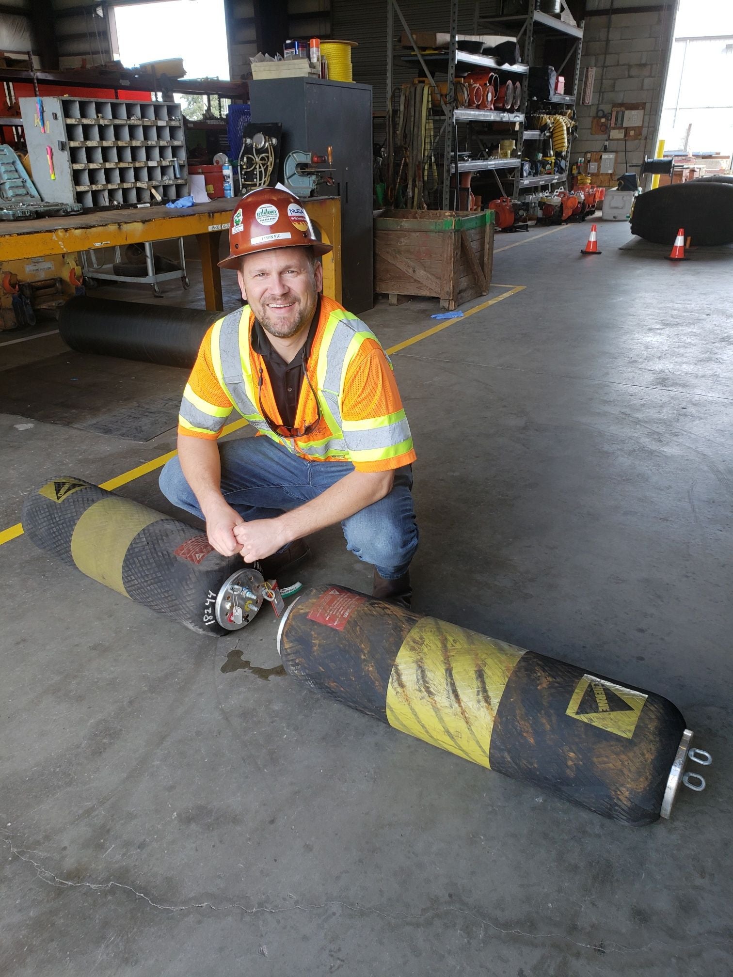 Man with Cherne I-Series Test Plugs in warehouse